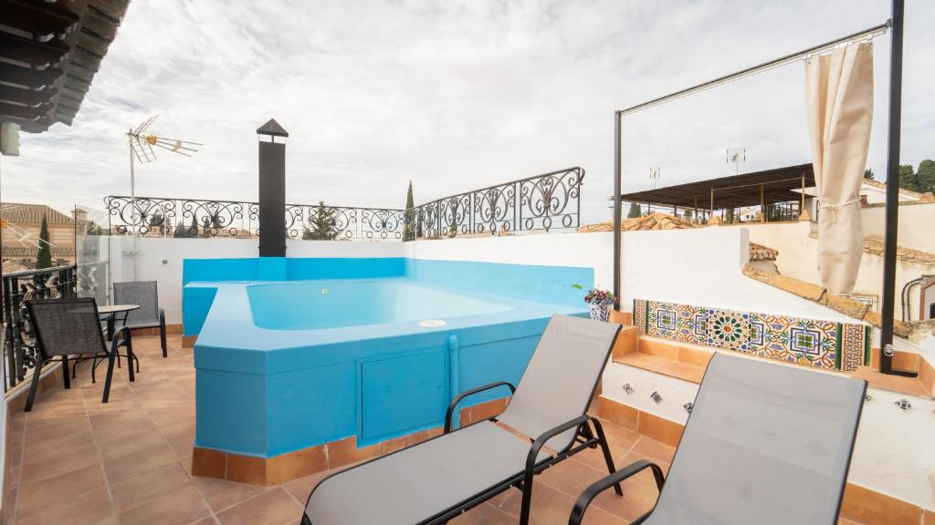Solárium y piscina privada de la habitación Deluxe